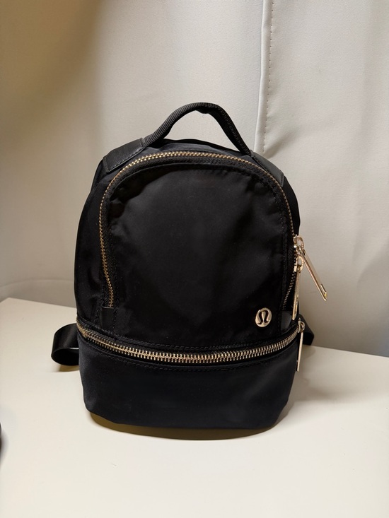 lululemon athletica Handbags - Lululemon City Adventurer Backpack Micro 3L Black Gold Hardware